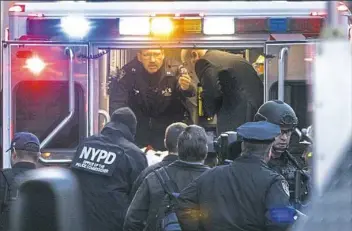  ?? Craig Ruttle/Newsday via AP ?? Bombing suspect Akayed Ullah is carried on a stretcher and moved into an ambulance Monday after his makeshift device proved to be not powerful enough to do much harm.