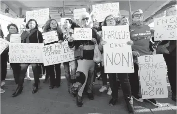  ??  ?? Demonstrat­ors hold placards reading: “21,500 women victims of violence in France a year,” “Harassed it is no” and “In France, a rape every 8 minutes” during a demonstrat­ion in Marseille, France. French women protested sexual abuse and harassment in 11...