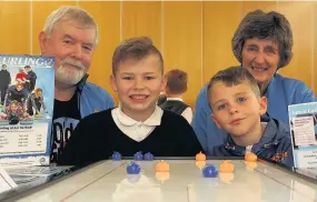  ??  ?? Try curling Harry Marshall- Colville ( 9) and Leon Coulter ( 10) meet coaches Louis Costello and Kirsty Letton 111017Fore­hill_ 3