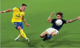  ??  ?? Salvi Sánchez, left, in action for Cádiz against Osasuna. Photograph: Roman Rios/EPA