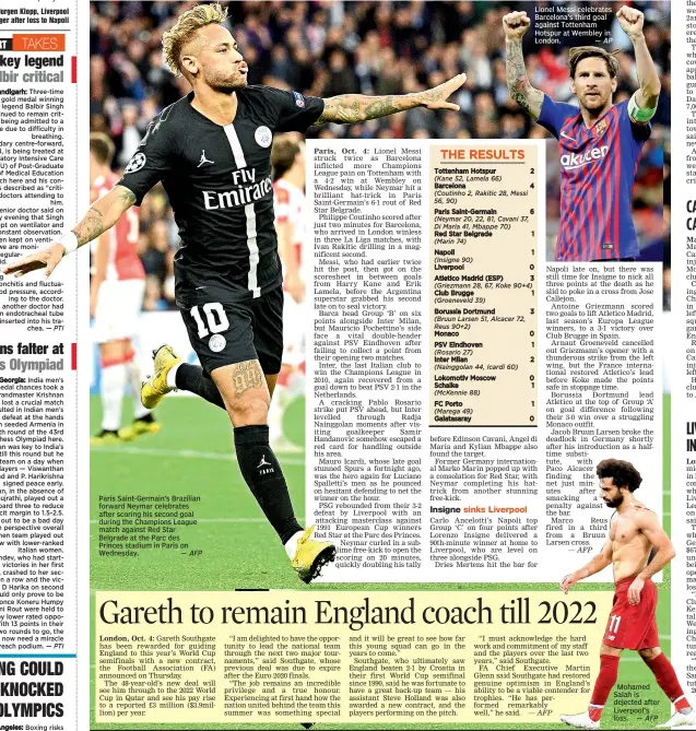  ?? AFP AP ?? AFP Mohamed Salah is dejected after Liverpool’s loss. — Paris Saint-Germain’s Brazilian forward Neymar celebrates after scoring his second goal during the Champions League match against Red Star Belgrade at the Parc des Princes stadium in Paris on Wednesday. — Lionel Messi celebrates Barcelona’s third goal against Tottenham Hotspur at Wembley in London. —
