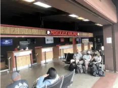  ?? Photos courtesy Mokulele Airlines ?? Passengers await their flights on Monday at the newly renovated Kahului Commuter Terminal.