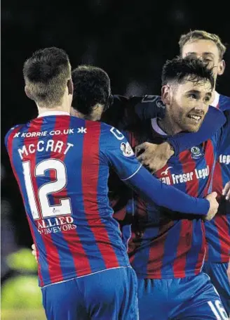  ??  ?? GOAL TO SAVOUR: As Caley Thistle’s Grag Tansey celebrates with his team-mates