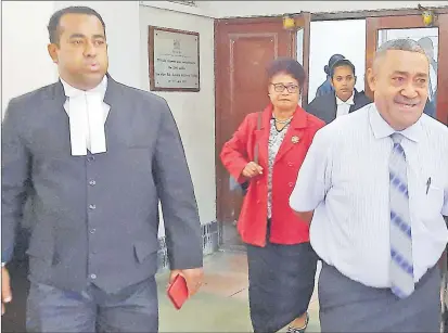  ?? Picture: IAN CHUTE ?? Filimoni Vosarogo and Ratu Suliano Matanitobu­a leave the High Court in Suva yesterday.