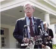  ?? EVAN VUCCI AP ?? National Security Advisor John Bolton speaks about Venezuela outside of the White House on Tuesday.