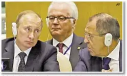  ?? AP ?? Vitaly Churkin (center), Russia’s UN rep, who died Monday, at UN in 2015 with Russian President Vladimir Putin (left) and Foreign Minister Sergey Lavrov.