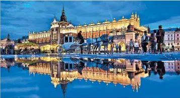  ?? DOMINIC ARIZONA BONUCCELLI/RICK STEVES’ EUROPE Sleeping: www.goldenlion.pl).
www.donimir ski.com/hotel-maltanski). Eating: ?? A rain puddle reflects the floodlit charm of Cloth Hall, one of several major buildings on Krakow’s Main Market Square.
Golden Lion Guest House is basic but well-located, with 11 small, dated rooms off the Main Market Square (budget,
Hotel Maltanski...