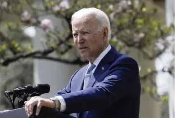  ?? YURI GRIPAS
Abaca Press/TNS, file 2021 ?? President Joe Biden has yet to sign a presidenti­al determinat­ion to end the 15,000-person cap on refugee settlement­s. Biden is on track to accept the fewest refugees this year of any modern U.S. president.