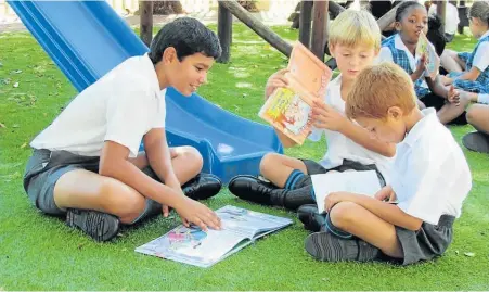  ??  ?? STORY TIME: Summerwood Primary School pupils also took part in the World Read Aloud Day earlier this month