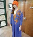  ?? (Pine Bluff Commercial/I.C. Murrell) ?? Customary Moroccan dress was on display at a cultural exhibit Saturday inside the Donald W. Reynolds Community Services Center.