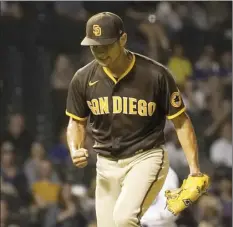 ?? AP photo ?? Padres pitcher Yu Darvish reacts after striking out the Cubs’ Ian Happ to end the eighth inning Monday.