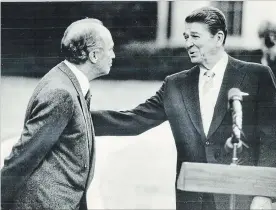  ?? TORONTO STAR FILE PHOTO ?? Prime Minister Pierre Trudeau meets with U.S. President Ronald Reagan. In spite of their political difference­s, Reagan was respectful, something Donald Trump could learn more about.