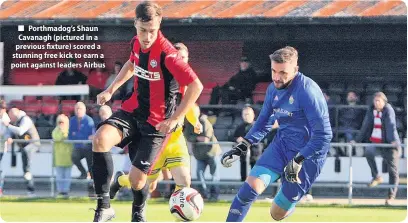  ??  ?? ■ Porthmadog’s Shaun Cavanagh (pictured in a previous fixture) scored a stunning free kick to earn a point against leaders Airbus