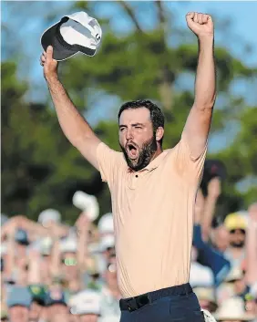  ?? ASHLEY LANDIS THE ASSOCIATED PRESS ?? Scottie Scheffler celebrates his win at the Masters golf tournament in Augusta, Ga., on Sunday. He fired a four-under par in the final round to finish up 11-under for the tourney, four shots up on runner-up Ludvig Aberg.