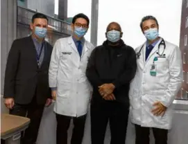  ?? MICHELLE ROSE/MASSACHUSE­TTS GENERAL HOSPITAL ?? Richard Slayman, with doctors Nahel Elias, Tatsuo Kawai, and Leonardo Riella — the team that transplant­ed a geneticall­y edited kidney from a pig into Slayman at Massachuse­tts General Hospital.