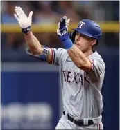  ?? MEGAN BRIGGS — GETTY IMAGES ?? Texas' Evan Carter rounds the bases after hitting a two-run home run in the fourth inning of Wednesday's wild-card game.