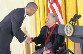  ?? ASSOCIATED PRESS ?? President Barack Obama shakes hands with author Rudolfo Anaya after presenting him with the 2015 National Humanities Medal in Washington, D.C.
