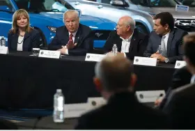  ?? The Associated Press ?? President Donald Trump speaks during a March 15, 2017, roundtable discussion at the American Center of Mobility in Ypsilanti Township, Mich. From left are, GM CEO Mary Barra, Trump, UAW President Dennis Williams and Ford CEO Mark Fields. Trump will skip the second GOP presidenti­al debate next week to travel to Detroit as the auto worker strike enters its second week.