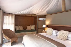  ??  ?? A BEDROOM suite at the Dwyka Tented Lodge.