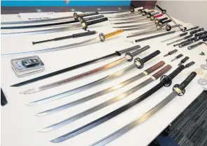  ??  ?? Knives, knuckledus­ters and swords have been seized by North West police forces during the last week in a drive to combat organised crime. Officers warn that importing knives from abroad over the internet is a criminal offence