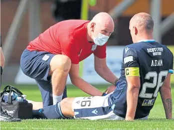  ??  ?? Dundee’s Charlie Adam had to leave the field with just 29 minutes gone.