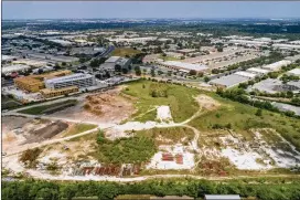  ?? JAY JANNER / AMERICAN-STATESMAN ?? Precourt Sports Ventures aims to privately finance a stadium on city land at McKalla Place in North Austin in exchange for use of the property.