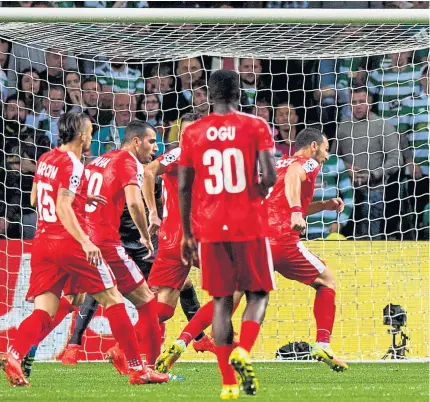  ??  ?? Scott Brown scores Celtic’s fifth goal against Hapoel Be’er Sheva after the manager had made