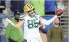  ?? JIM MATTHEWS/USA TODAY NETWORK-WISCONSIN ?? Green Bay Packers tight end Robert Tonyan reacts after catching a touchdown pass against Seattle.