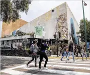  ?? RODRIGO CRUZ / THE NEW YORK TIMES ?? The Justo Sierra Auditorium, which has been occupied by political protesters since 2000, is the site of one of the longest-running occupation­s of a university building in history and putting more famous college takeovers to shame.
