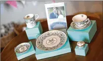  ?? GETTY IMAGES ?? A special edition crockery set is displayed ahead of the wedding of Prince Harry and Meghan Markle at William Edwards Home Ltd.