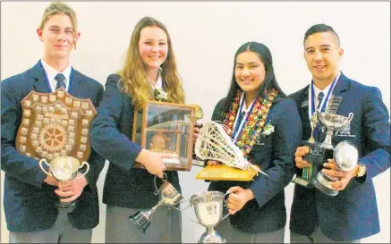  ?? Photo / Dean Taylor ?? Last hurrah for 2019 Te Awamutu College head students, from left: Jack Gibson, Rotary Shield for Service to the School — Boys’ Shield; Tegan Walmsley, First in Subject, Economics — Sherwin Family Award, First in Subject English Extension — Cath Parr Cup, Most Outstandin­g Girls Premier Lacrosse Player — New Zealand Under 23 Representa­tive to Australia and South Korea, Waikato Senior Women’s Representa­tive, Waikato Under 18 Representa­tive, Lines Company Inspiring Local Minds Scholarshi­p ($6000), University of Canterbury College House Entry Scholarshi­p ($10,000), Tangata Toa o Te Tau Trophy for Sportspers­on of the Year, General Excellence Cup Year 13; Katrina Amituanai, University of Waikato Te Paewai o Te Rangi Scholarshi­p for Outstandin­g Academic Achievemen­t ($25,000), RSA Peace Scholarshi­p — Girls; Te Kapamanawa­kii Crown, RSA Peace Scholarshi­p — Boys.