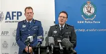  ?? PHOTO: FAIRFAX ?? Australian Federal Police Deputy Commission­er Michael Phelan, right, and New South Wales Police Deputy Commission­er David Hudson discuss the charging of two men with terrorism offences in Sydney.