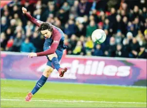  ?? THOMAS SAMSON/AFP ?? Paris Saint-Germain’s Uruguayan forward Edinson Cavani shoots on goal during the French Ligue 1 match between Paris Saint-Germain and Nantes at the Parc des Princes stadium in Paris on Saturday.