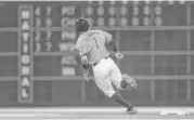  ?? Karen Warren / Houston Chronicle ?? Carlos Correa rounds second base in Saturday’s seventh inning after hitting his 21st homer, tying the Astros rookie record set by Lance Berkman in 2000.