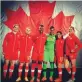  ??  ?? Karina LeBlanc (left, in black) on a recent trip to Dominica; with fellow members of Canada’s national soccer team (above, in green)