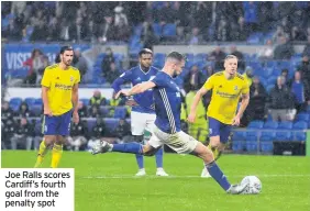  ??  ?? Joe Ralls scores Cardiff’s fourth goal from the penalty spot