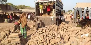  ??  ?? Yam Market in Anyiin, Logo Local Government