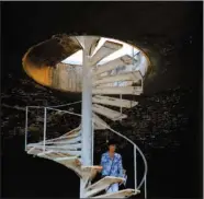  ?? (File Photo/AP/Hassan Ammar) ?? A visitor walks up the stairs on Oct. 20, 2018, of The Space Museum and Helipad, designed in the early 1960s by Niemeyer, at the Rachid Karami Internatio­nal Fair.