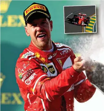  ??  ?? WINNER: Sebastian Vettel celebrates his victory on the podium. PHOTOS: GETTY IMAGES