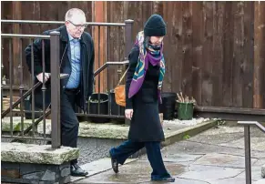  ?? — Bloomberg ?? Under close watch: Meng leaving her home under the supervisio­n of security personnel in Vancouver, British Columbia, Canada.