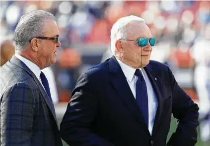  ?? Joe Robbins / Getty Images ?? Stephen Jones, left, began working alongside his father Jerry with the Cowboys after the latter’s 1989 takeover.