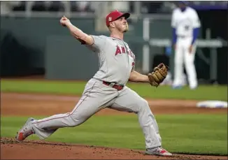  ?? Orlin Wagner Associated Press ?? ANGELS starting pitcher Dylan Bundy delivers in the first inning at Kauffman Stadium. Bundy went seven innings, surrenderi­ng two earned runs on five hits and two walks. He struck out six.