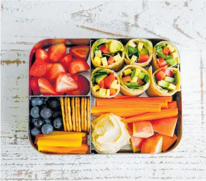  ?? ?? Use in season fruit and vegetables for a healthy and affordable school lunchbox.