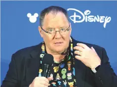  ?? — AFP file photo ?? Lasseter addresses a press conference during the D23 Expo fan convention at the Convention Center in Anaheim, on July 14, 2017.