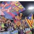  ?? FOTO:DPA ?? Barcelona-Fans feuern ihre Mannschaft an.