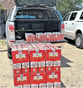  ??  ?? STOLEN GOODS: 790 litres of Shoprite long-life milk was confiscate­d and a shop owner arrested during a raid in Uitenhage yesterday