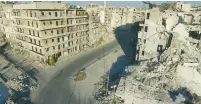  ?? (Reuters) ?? DRONE FOOTAGE taken yesterday shows damaged buildings in a rebel-held area of Aleppo, Syria.