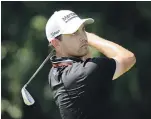  ?? AP ?? Patrick Cantlay hits from the second tee during the third round of the Tour Championsh­ip golf tournament in Atlanta on Saturday.