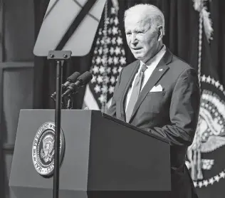  ?? Oliver Contreras / Bloomberg ?? President Joe Biden sketches out his latest plan Thursday to quell the pandemic, with at least three U.S. cases of the omicron variant now confirmed and threatenin­g to fuel a high case count.