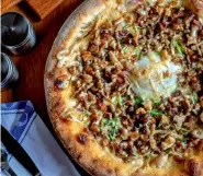  ??  ?? ABOVE: There’s nothing quite like their
Sisig Pizza for those comfort food cravings.